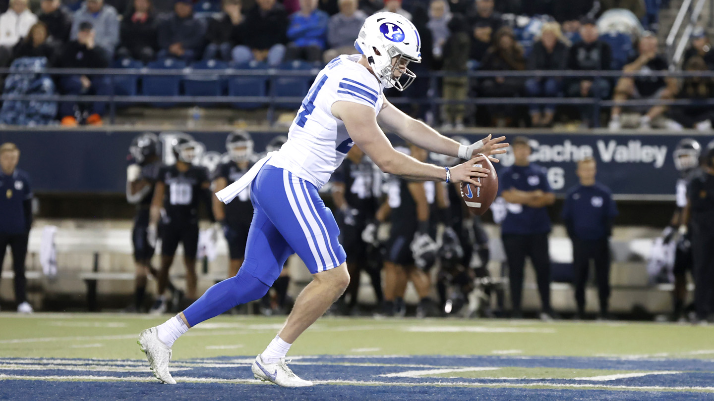 Ryan Rehkow punting at USU