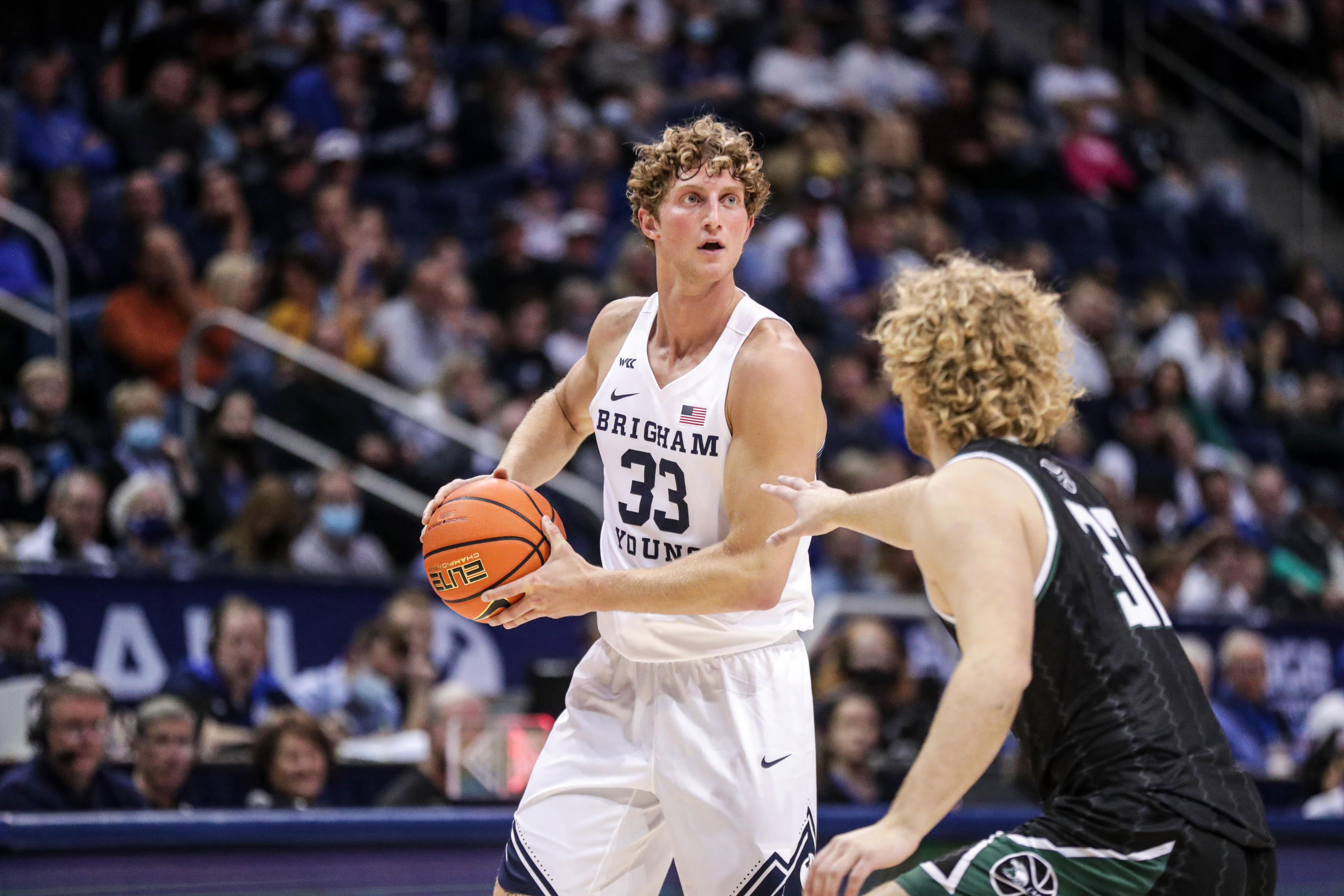 BYU basketball player Caleb Lohner surveys the court in the Cougars 97-61 victory over Central Methodist University.