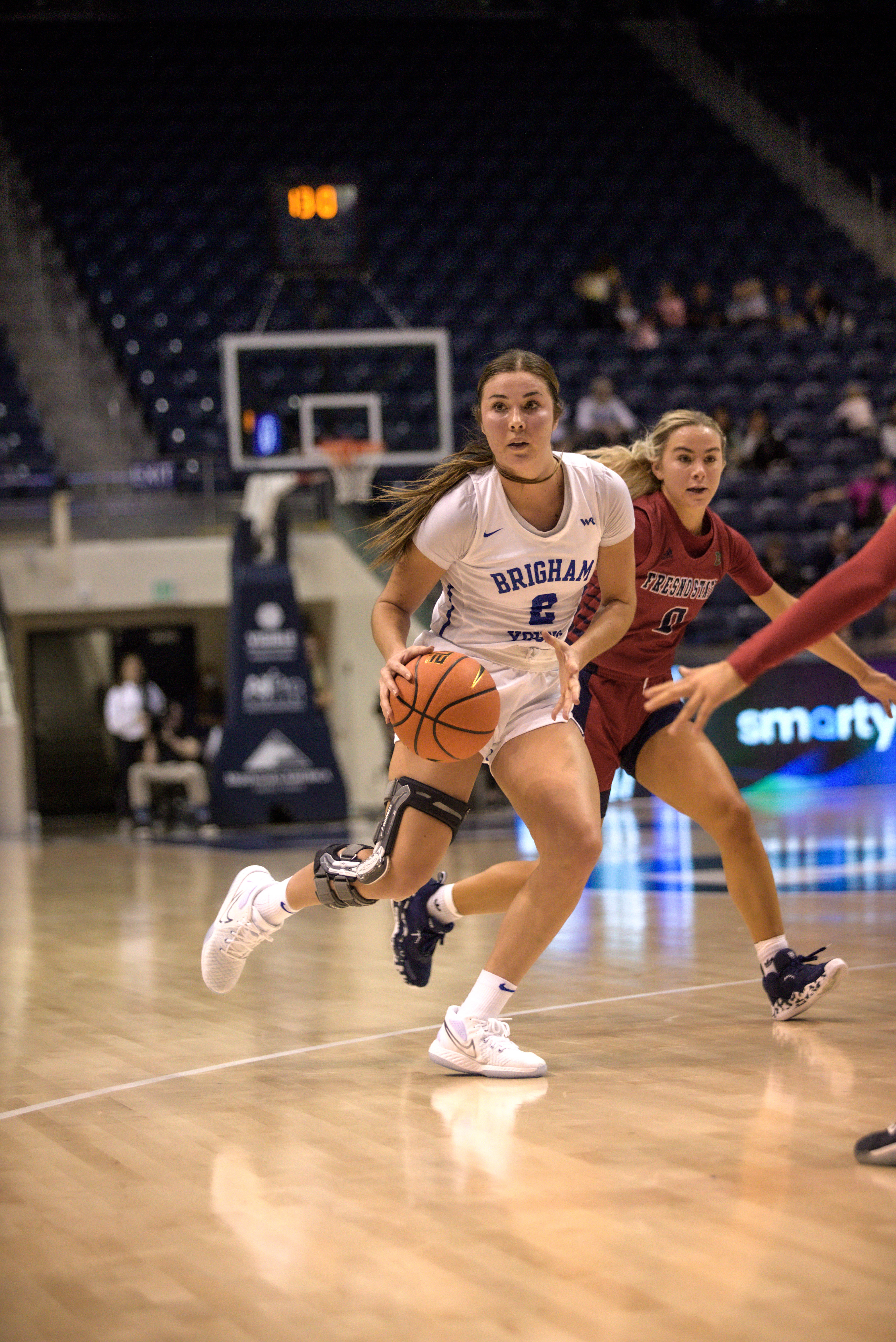 Shaylee Gonzales drives to the basket in an 80-64 BYU win over the Fresno State Bulldogs in the Marriott Center.