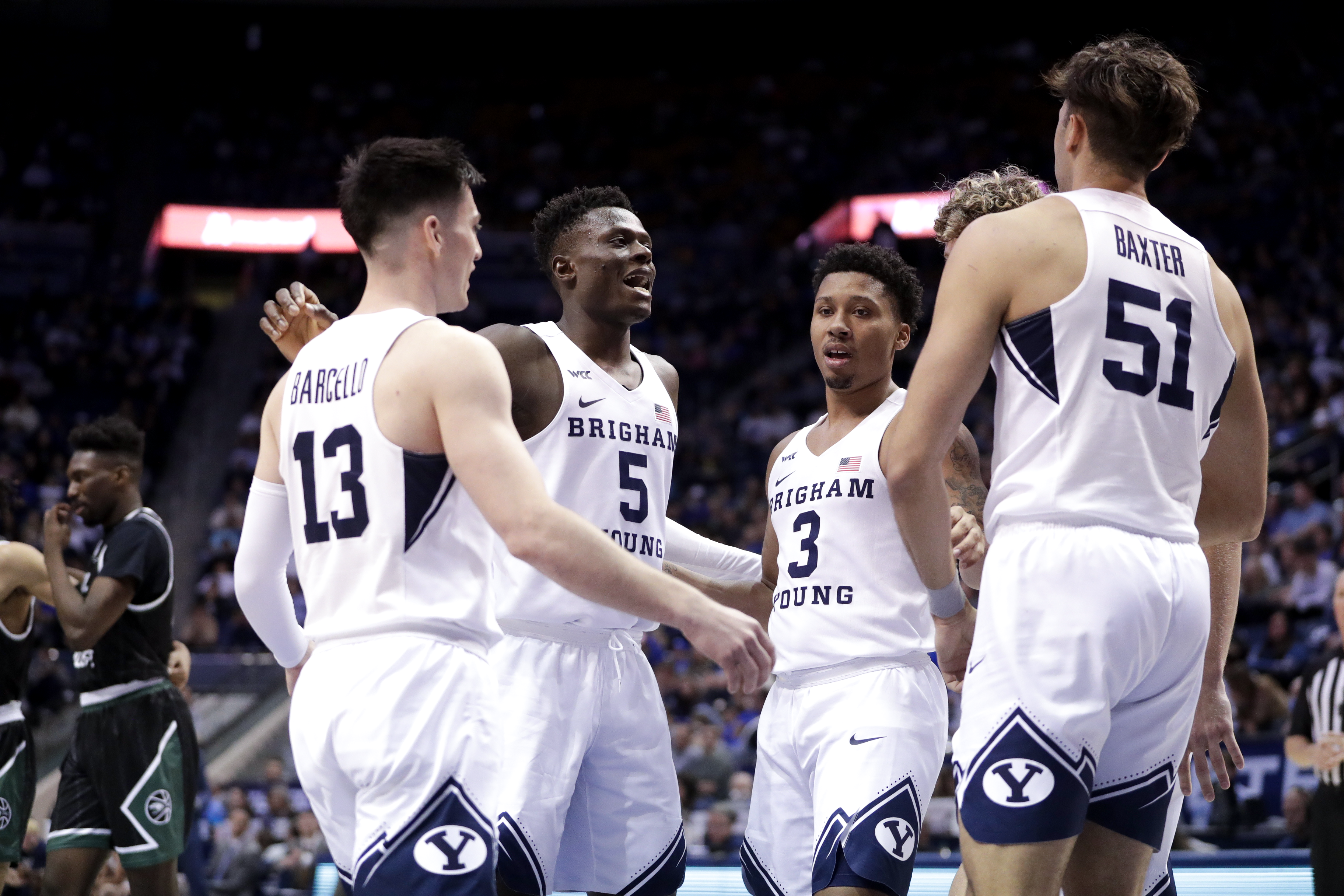 The BYU men's basketball team huddles during the Cougars 97-61 victory over Central Methodist University.