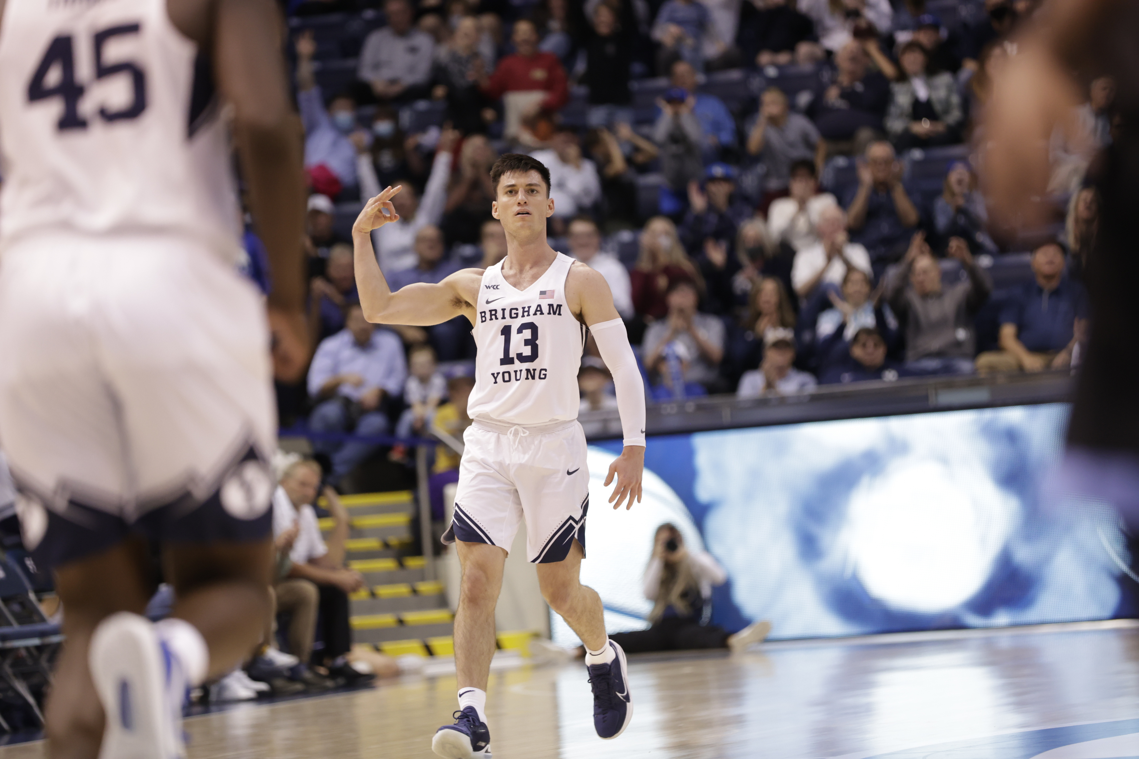 BYU men's basketball guard Alex Barcello celebrates a three point field goal in the Cougars 63-45 victory over Colorado Christian University.