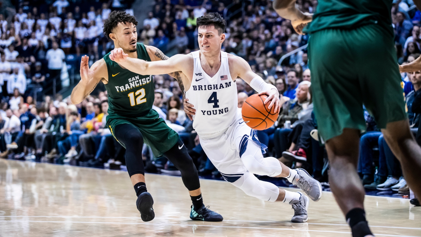 Alex Barcello drives with the ball against San Francisco