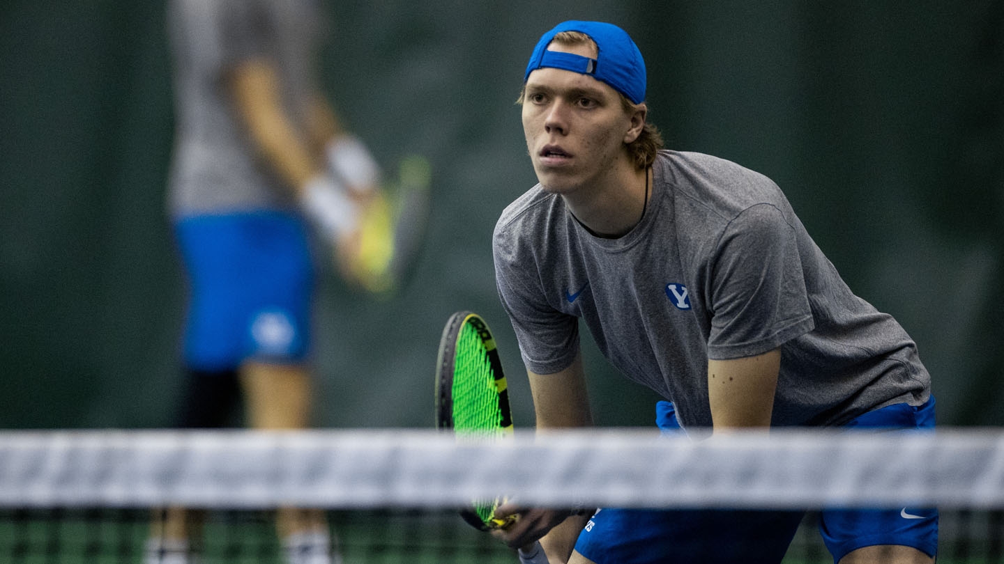 Jack Barnett awaits serve in doubles