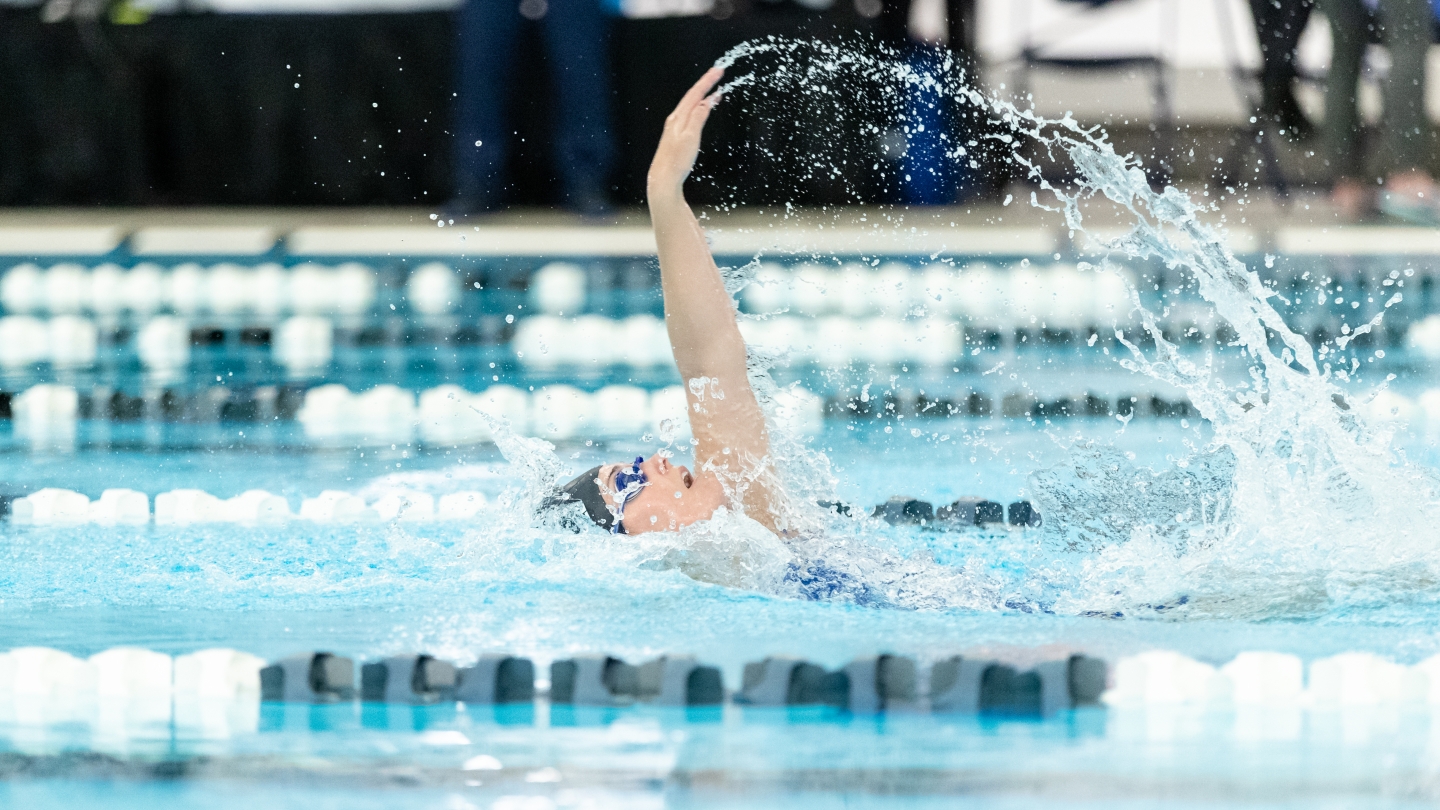 Megan Brimhall swimming the backstroke 