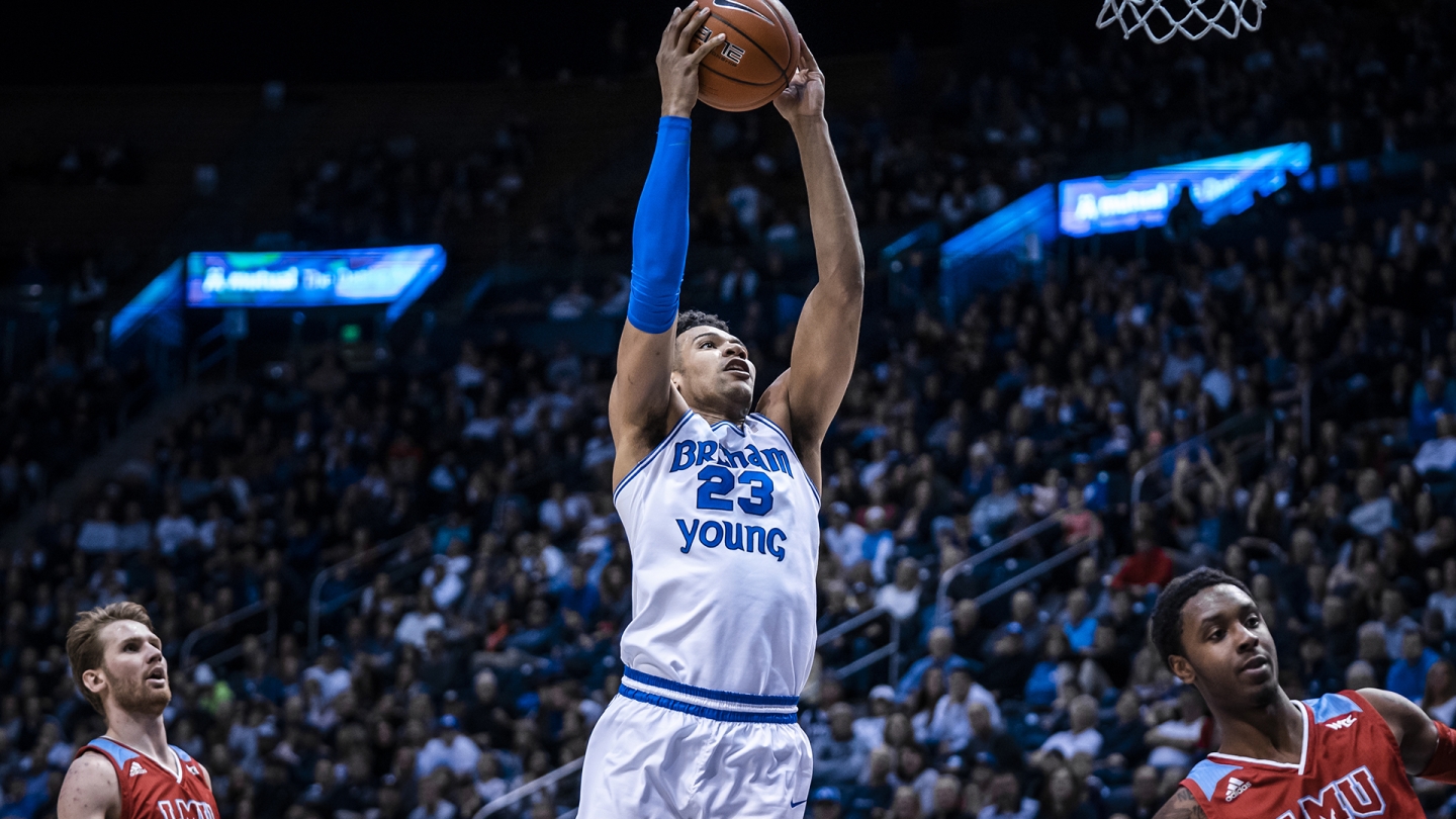 Yoeli Childs dunks the basketball against Loyola Marymount.