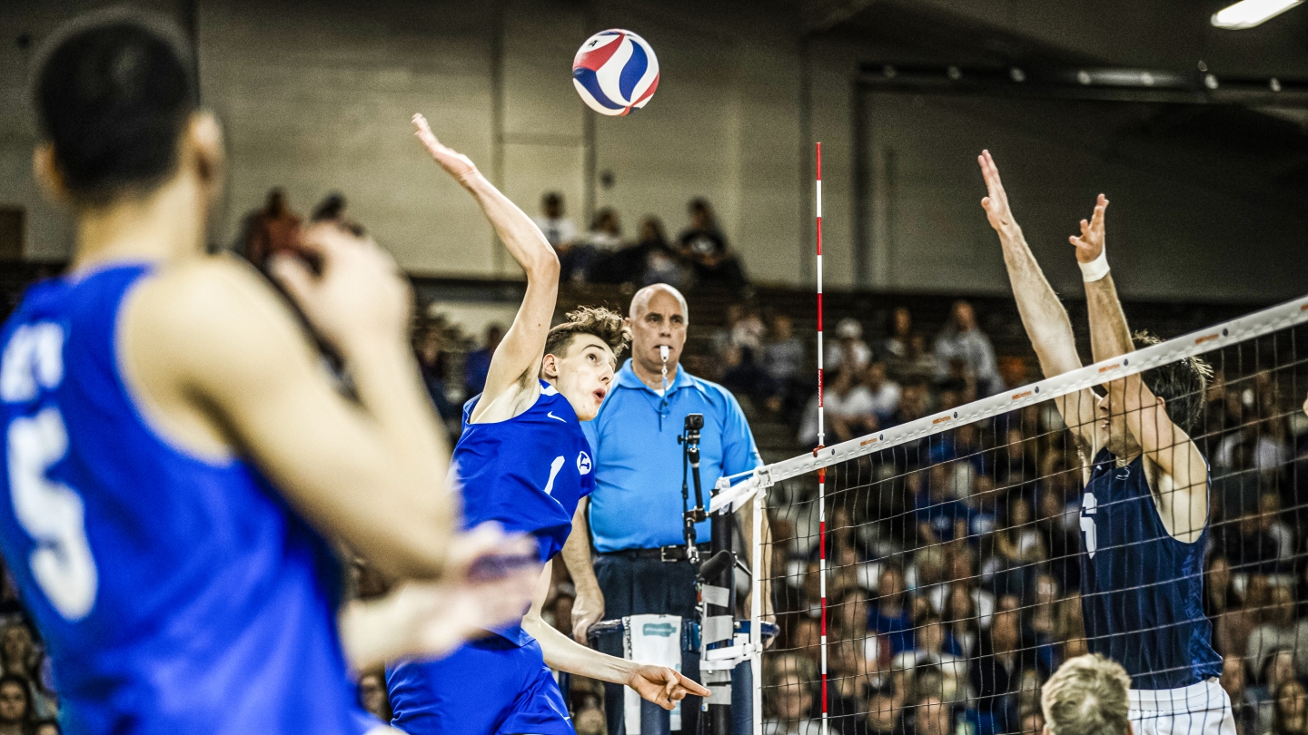 Davide Gardini attacks the ball in BYU men's volleyball match
