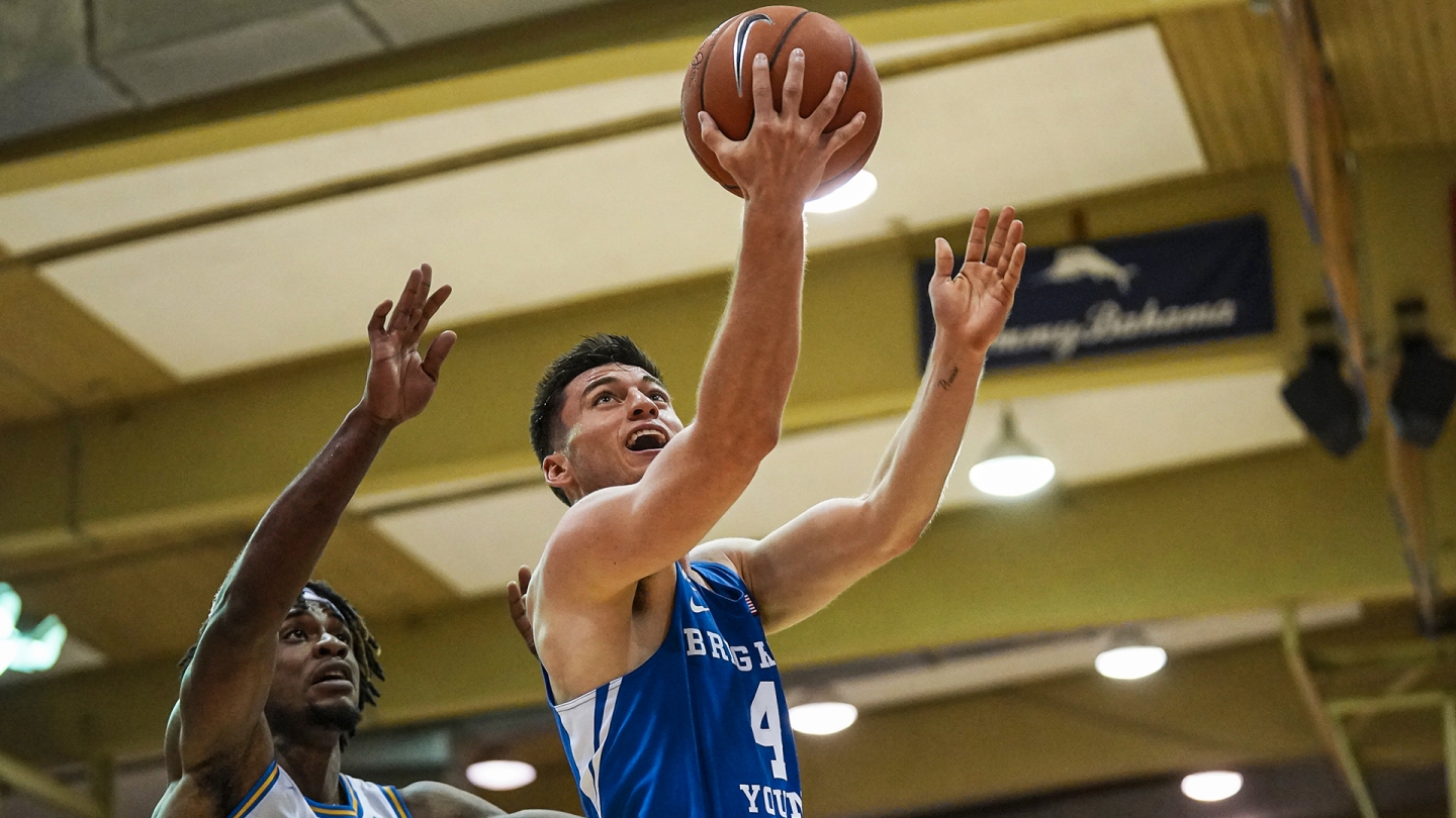 Alex Barcello drive for a reverse layup against UCLA in Maui.