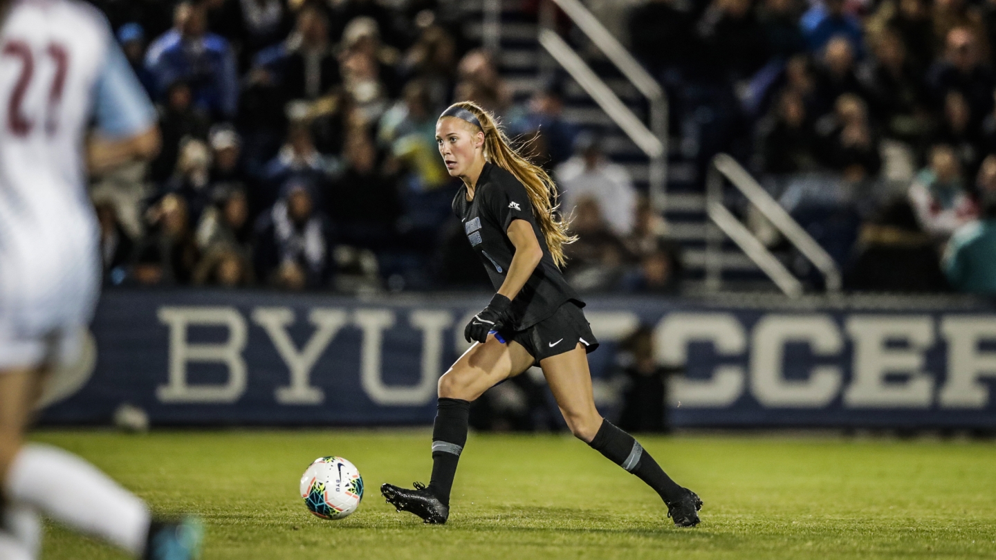 Mikayla Colohan controls the ball against LMU