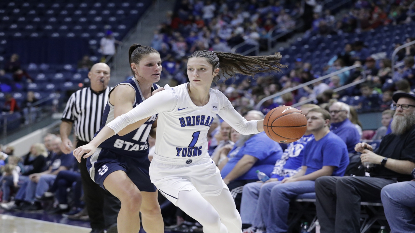 Brenna Drollinger with ball vs. USU