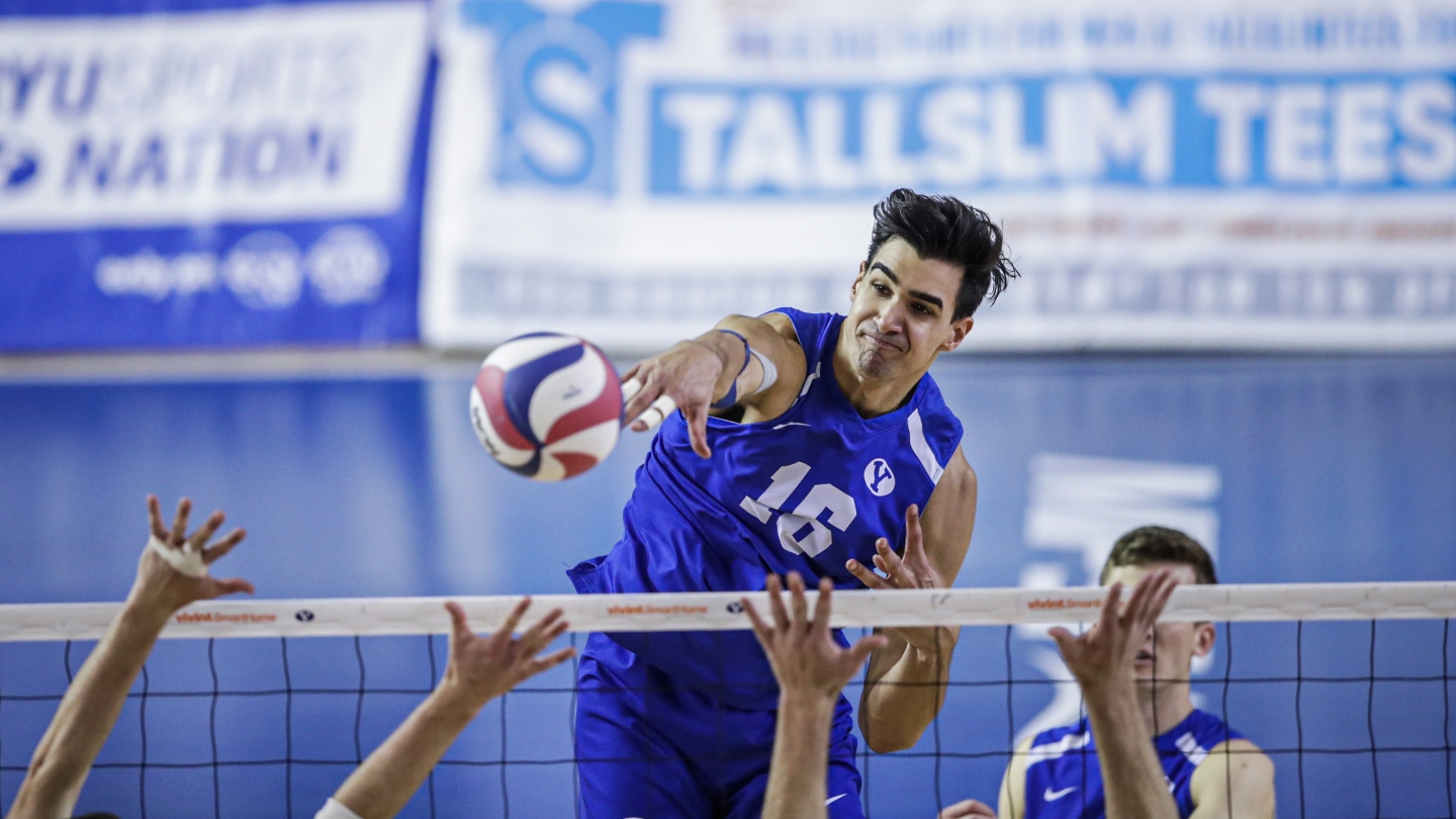 Felipe de Brito Ferreira spikes the ball in a match featuring BYU men's volleyball and UCSB