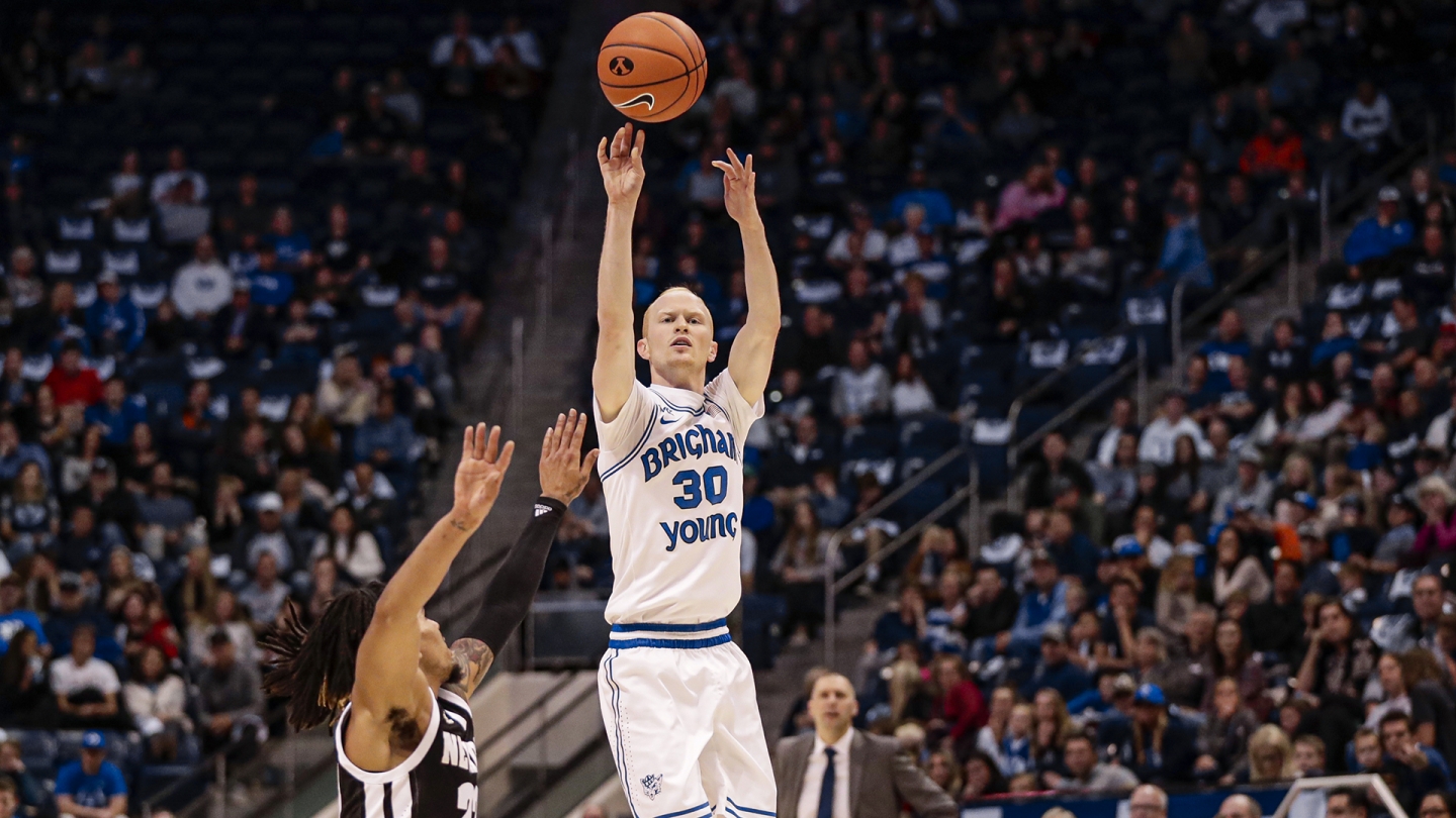 TJ Haws shoots a 3-point shot against Nevada.