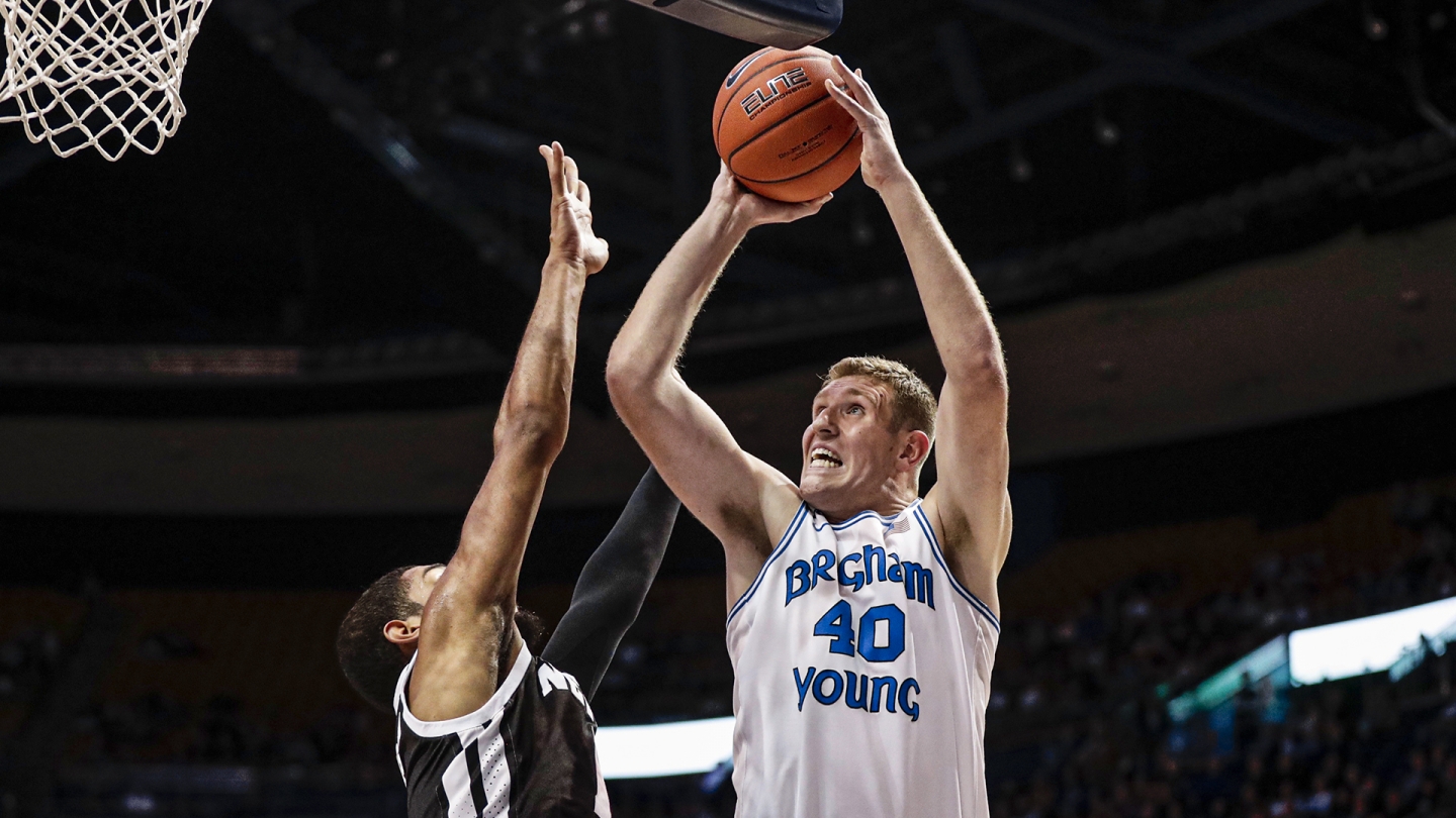 Kolby Lee takes the ball to the basket for a shot against Nevada.