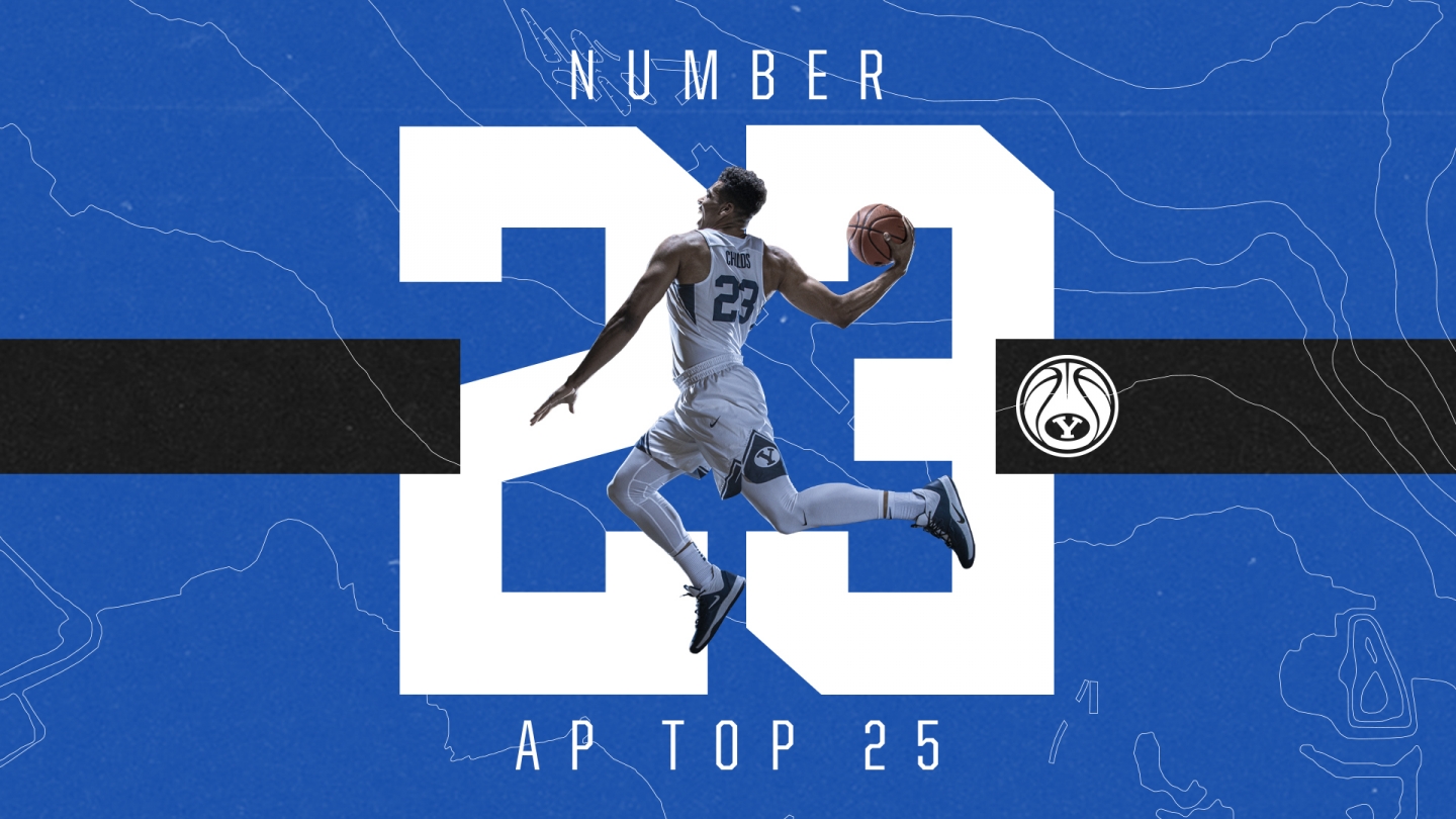 Graphic of Yoeli Childs jumping to dunk a ball and the text No. 23 AP Top 25