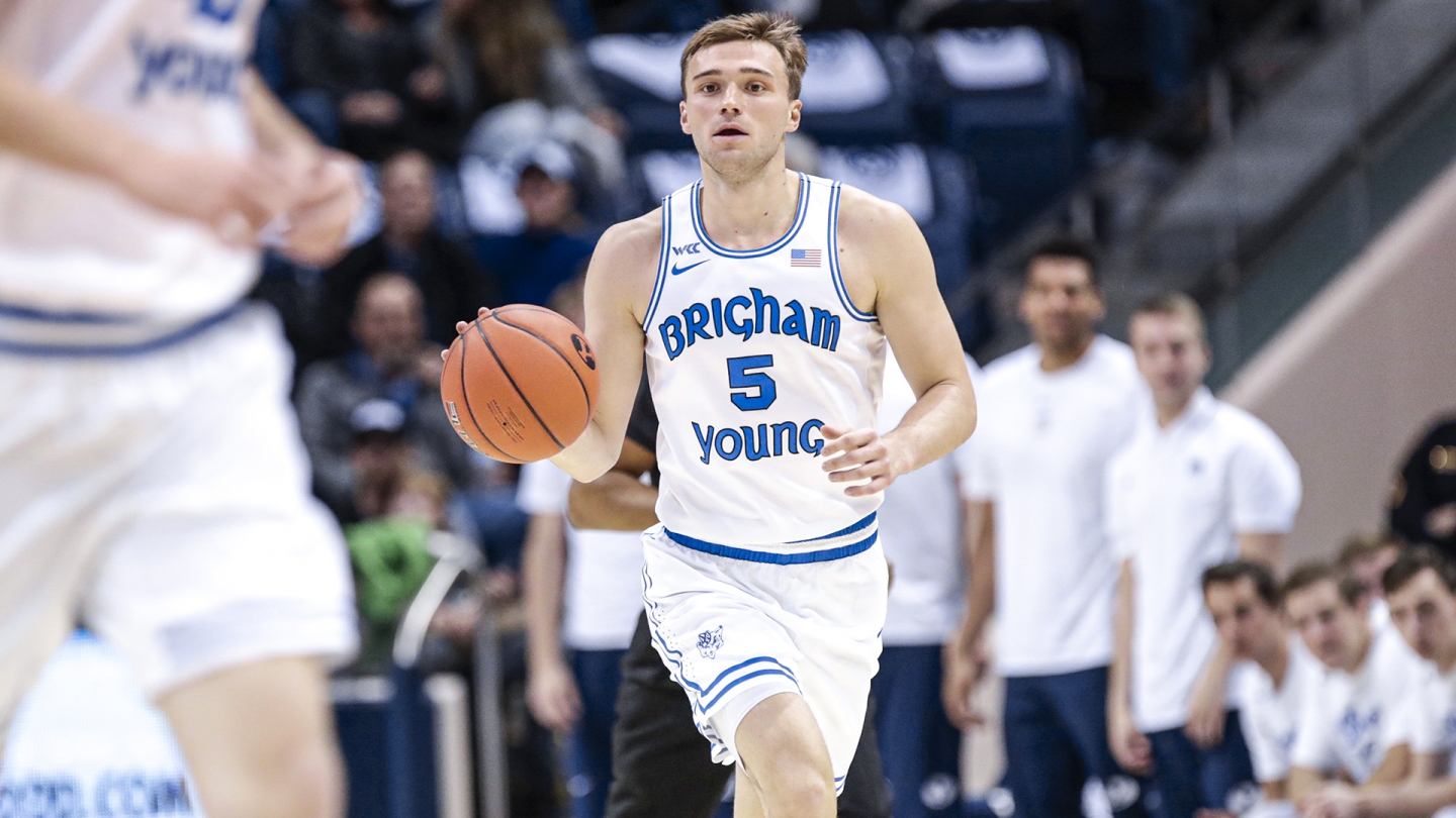 Jake Toolson brings the ball up the court against Montana Tech in the Marriott Center.