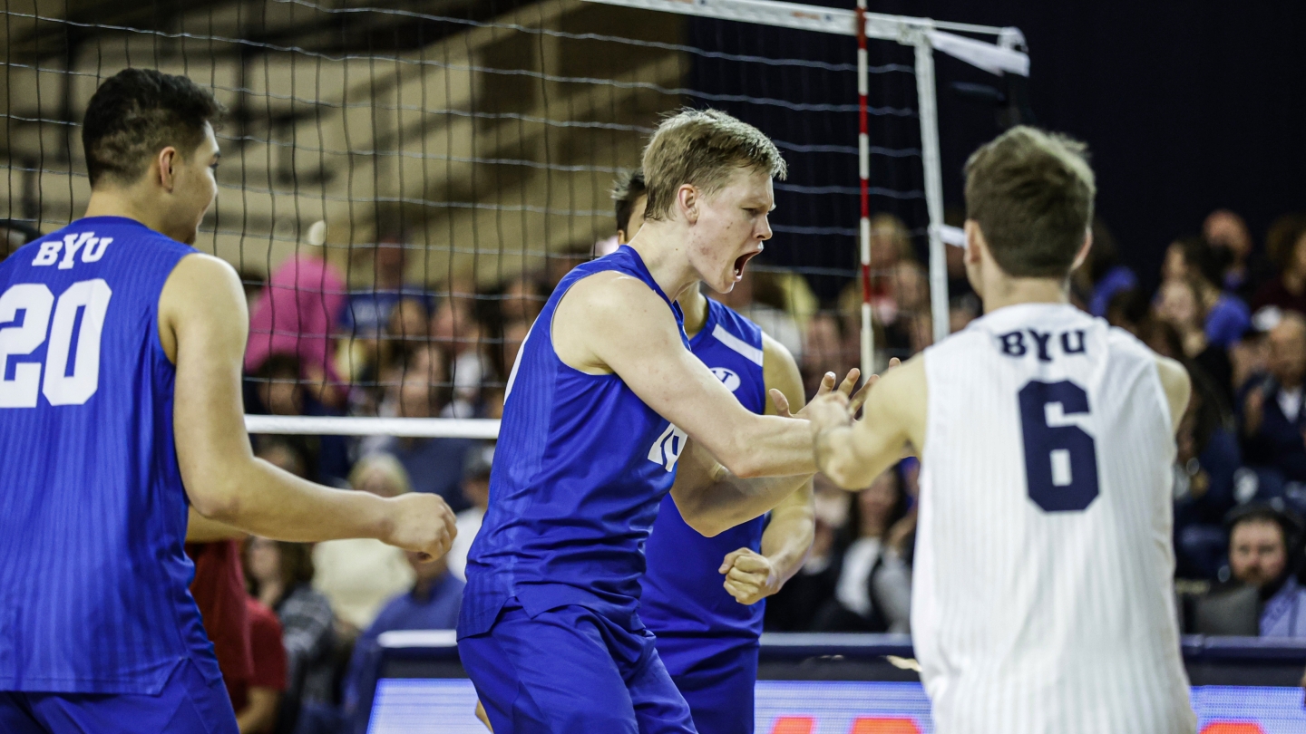 Miki Jauhiainen celebrates with BYU men's volleyball teammates after scoring for the Cougars