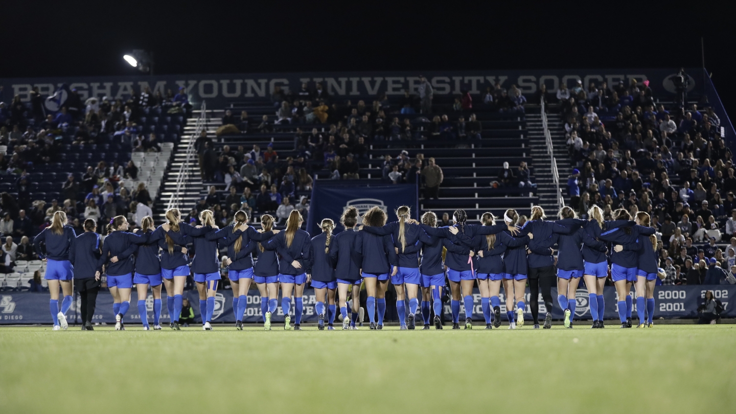 The BYU women's soccer team walks out to start the NCAA tournament.