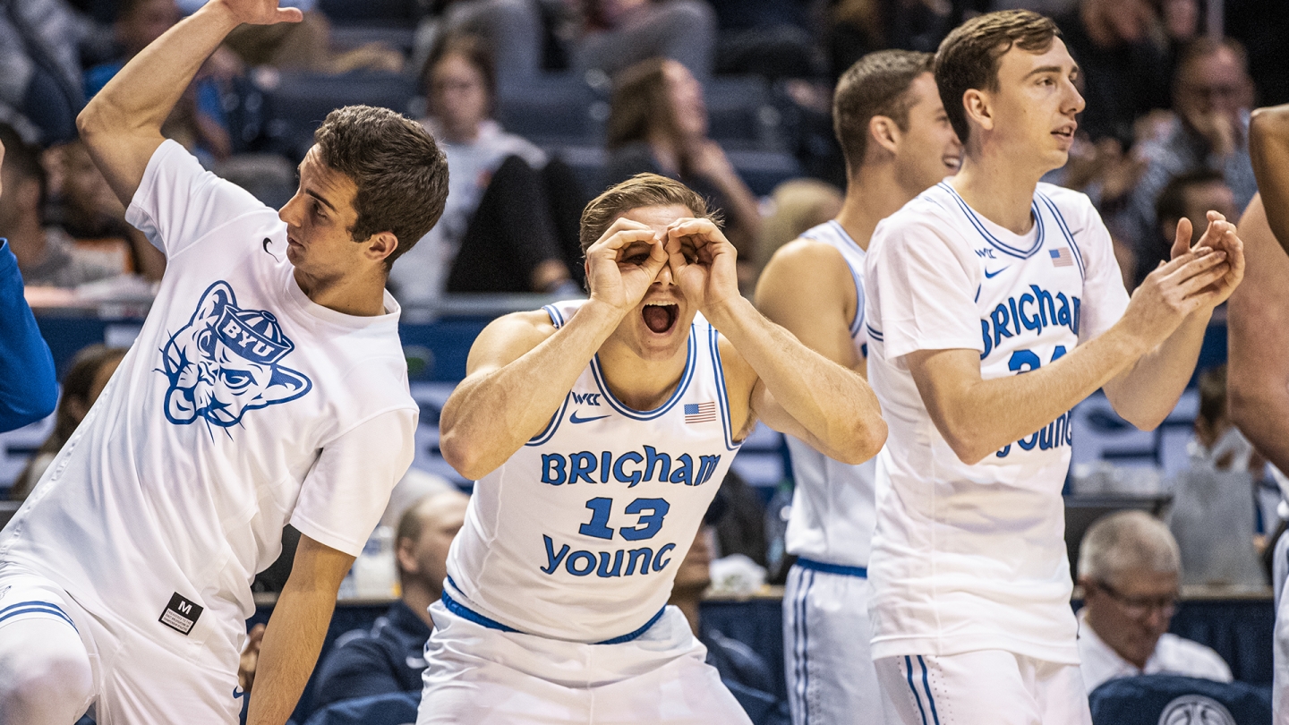 Cameron Pearson and Taylor Maughan celebrate a made 3-pointer against Nevada.