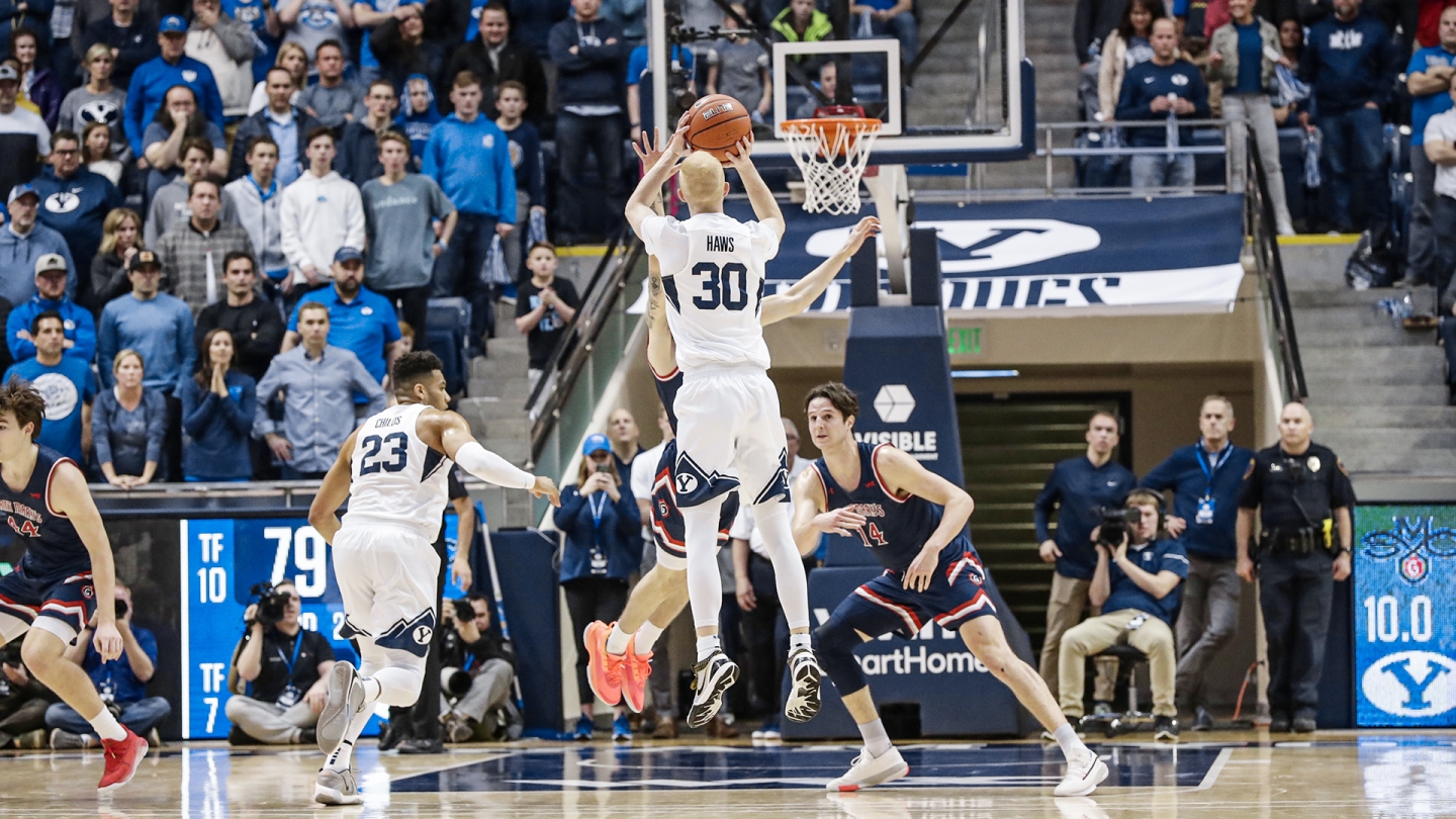 TJ Haws shoots a 3-pointer from the top of the key against Saint Mary's.