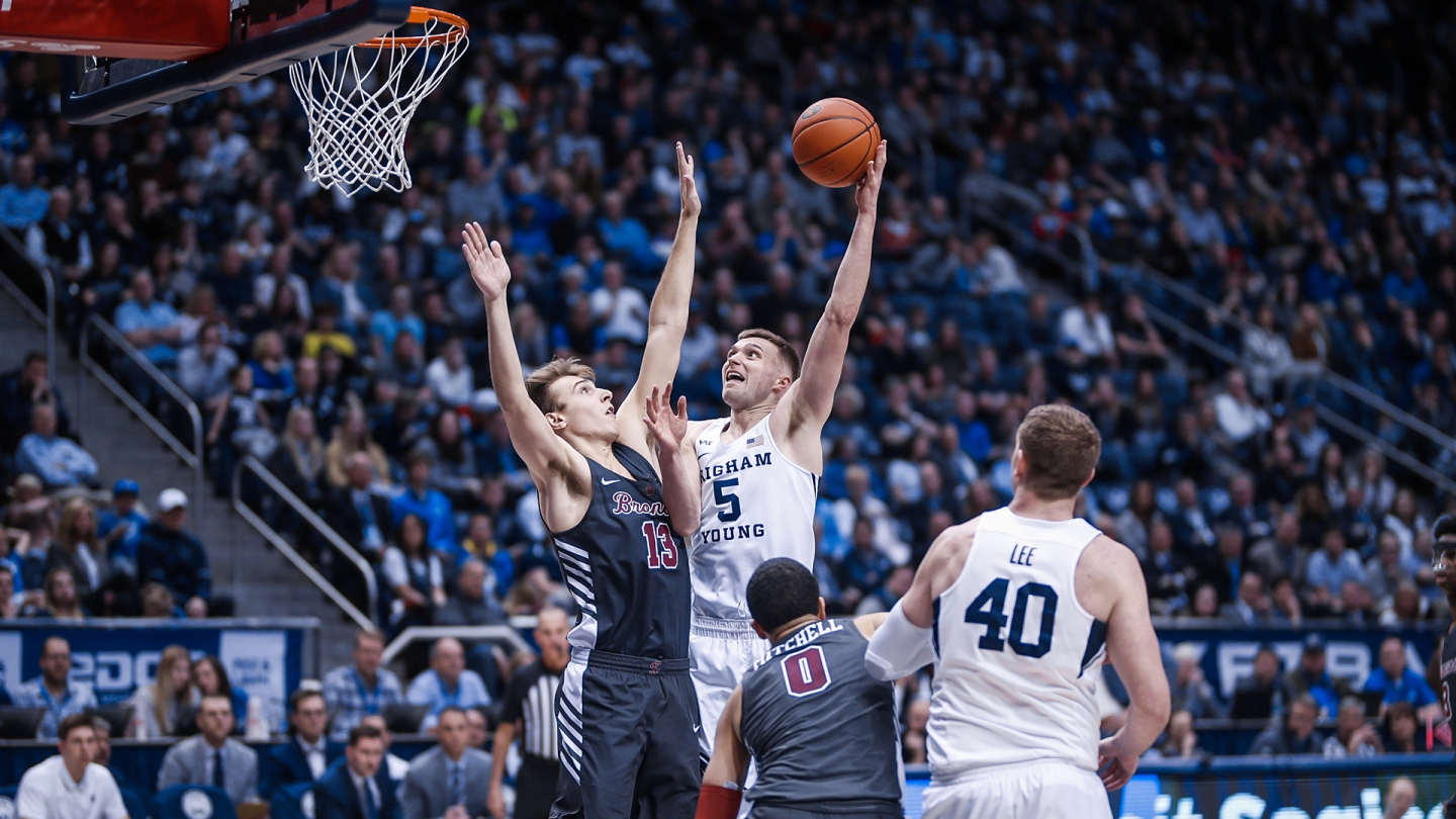 Jake Toolson shoots a hoot shot with his left hand against Santa Clara.